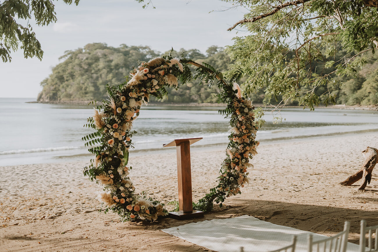 costa rica A wedding ceremony set up on the stunning Playa beach in Costa Rica, captured beautifully by a talented Costa Rica photographer.