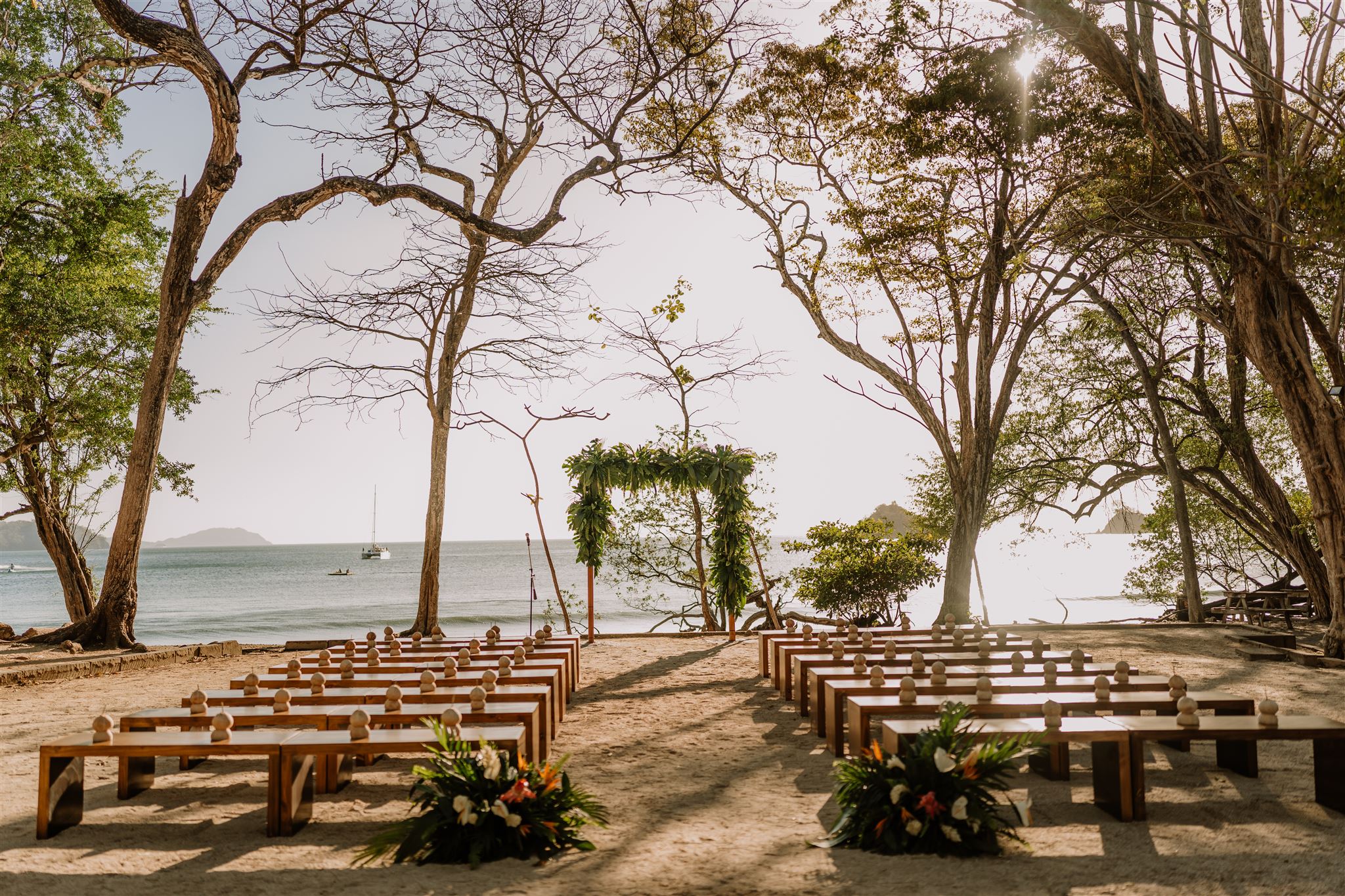 costa rica A wedding ceremony set up on the beach in Costa Rica captured by a professional photographer.