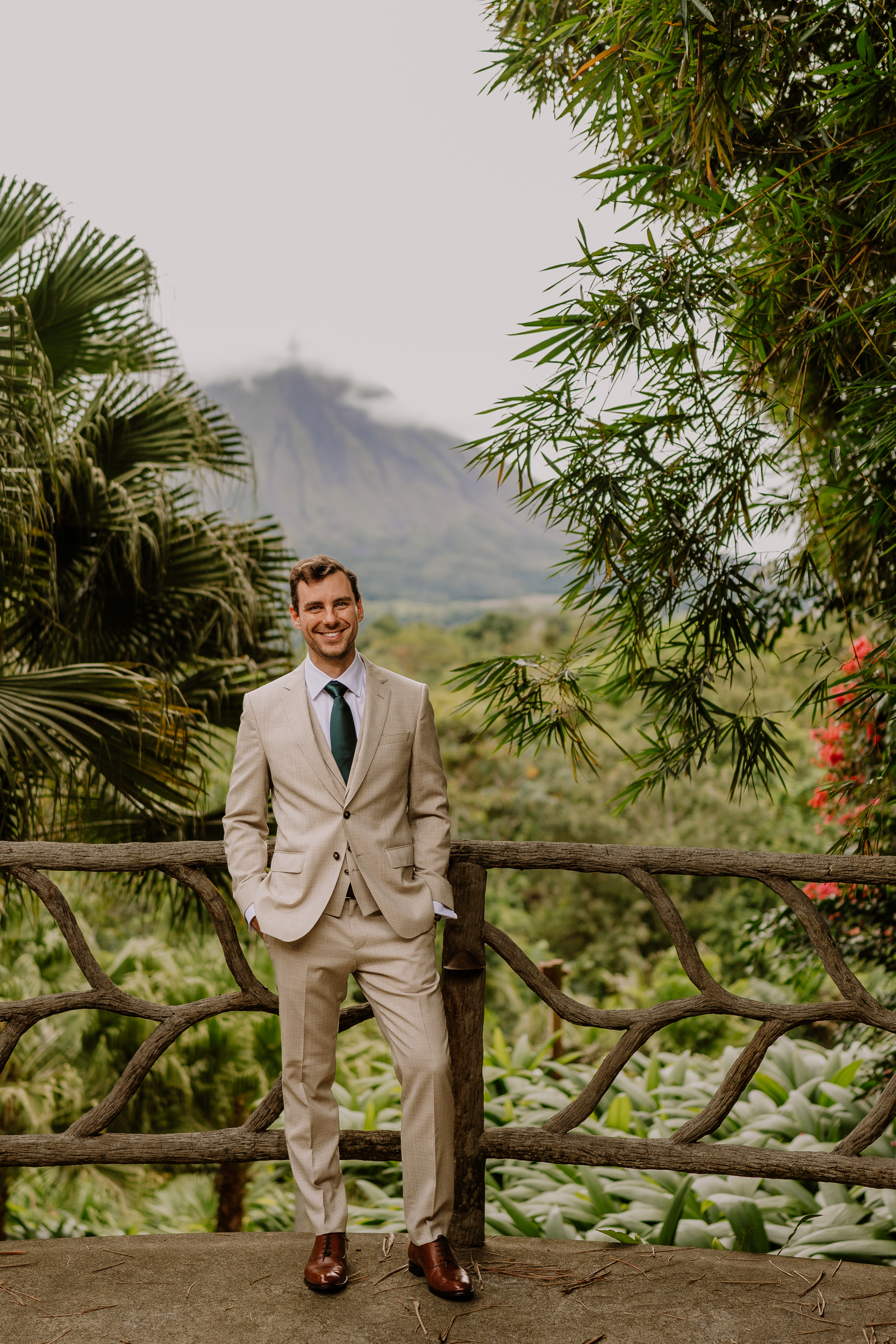 Duke waiting for Tina with a view of the Arenal volcano