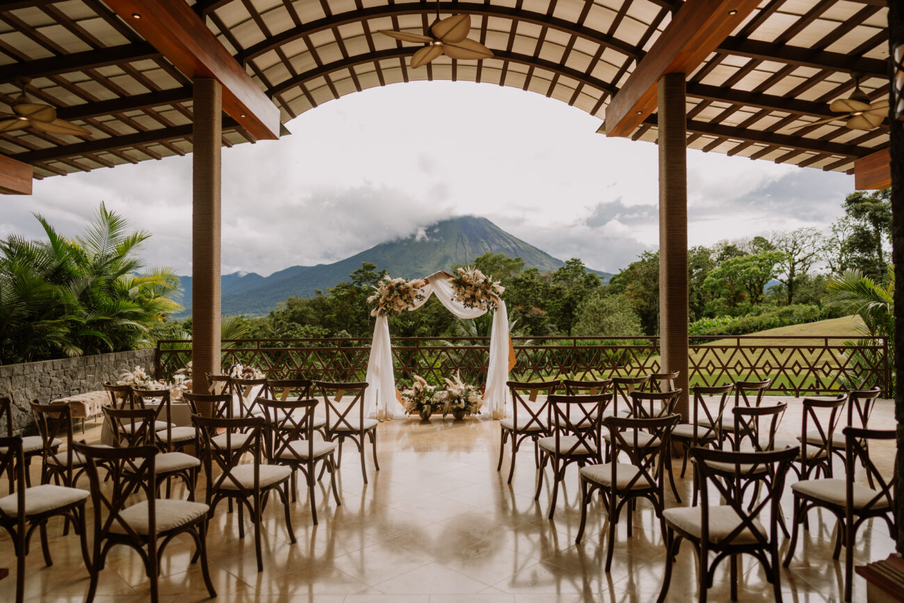 costa rica A wedding ceremony set up with chairs and a view of the mountains, perfect for capturing memorable photos.