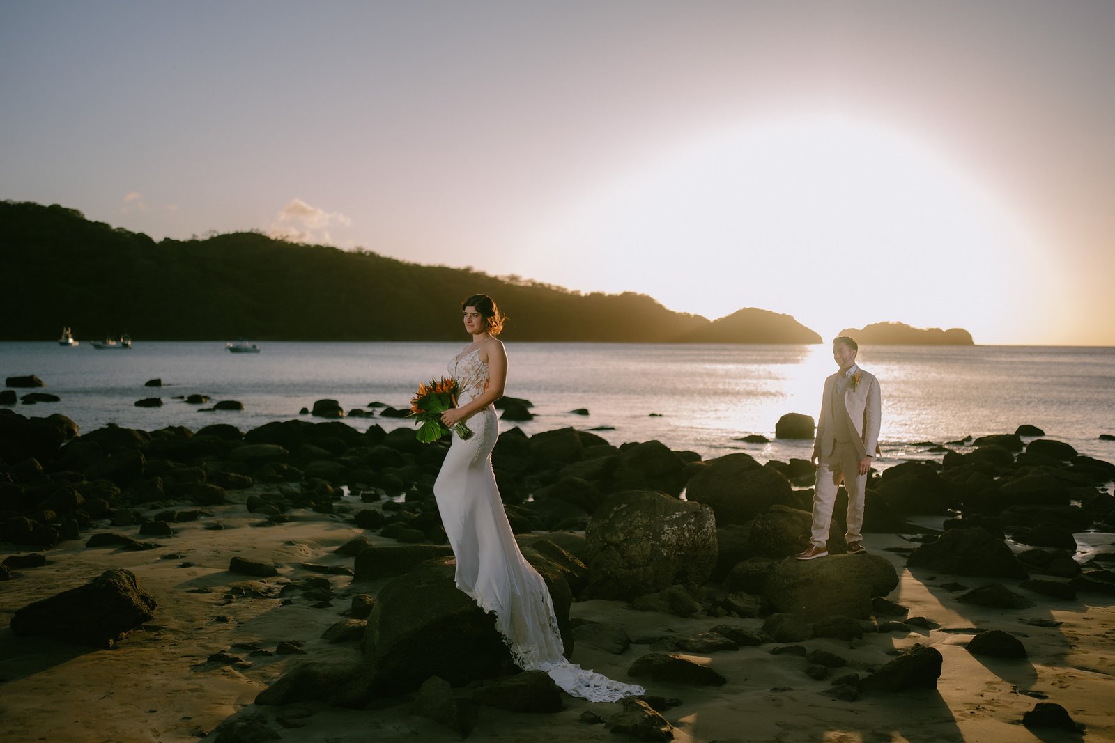 Couple silhouette at sunset on Playa El Jobo at JW Marriott Costa Elena, Guanacaste, Costa Rica.