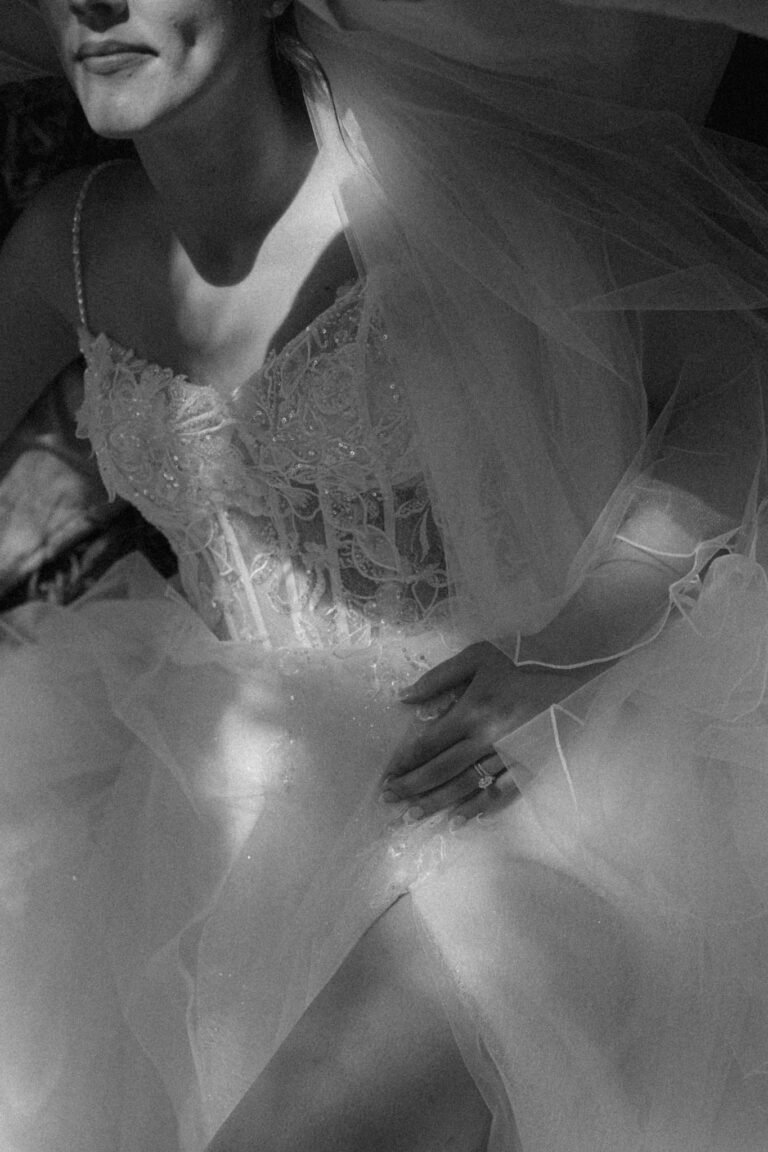 Best Documentary Wedding Photographers In Costa Rica | Adri and Lucas 18 Black and white detail of lace wedding dress and veil at a Costa Rica wedding